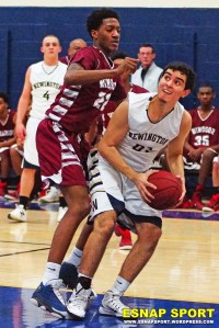 Windsor’s Jordan Powell can’t deny Pablo Ortiz in CCC Tournament first round action.